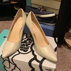 Ivory pumps
